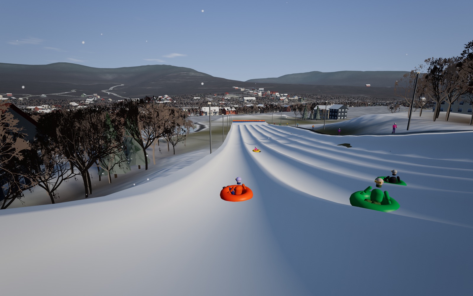 Racing down a lane of the Tubing Hill against two other tubers